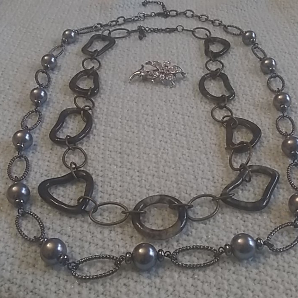 2 necklace and flower brooche